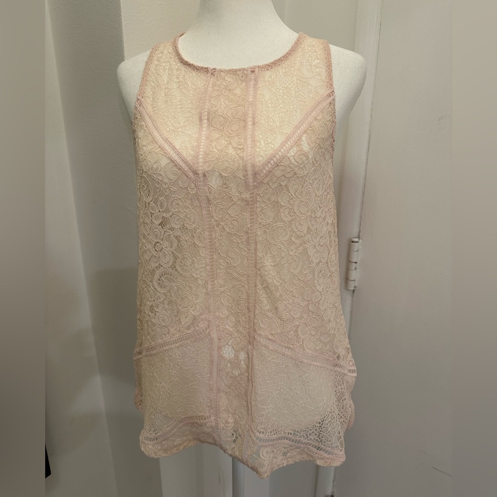 Express women’s tank size medium. Never worn. Lace top light pink.